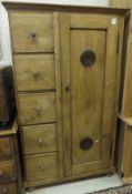 A Continental pine food cupboard with ve