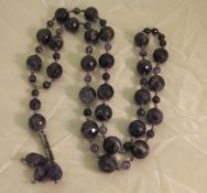 A faceted bead amethyst necklace with cu
