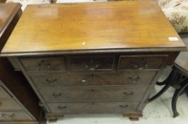 A mahogany chest of drawers in the Georg
