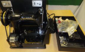 A Singer sewing machine 221 K1 with auto