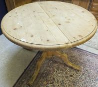 A modern waxed pine breakfast table, the