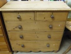 A pine chest of two short and three long