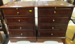 A pair of mahogany four drawer bedroom c