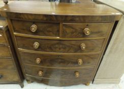 A Victorian mahogany bow fronted chest of two short and three long graduated drawers CONDITION