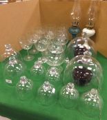 Twelve assorted glass food domes, four o