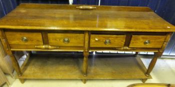 A modern oak dresser, the plain top with