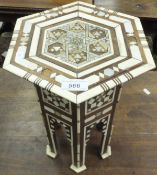 A small Eastern hardwood, bone and mother of pearl inlaid hexagonal occasional table CONDITION