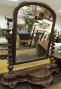 A Victorian mahogany toilet mirror on ba