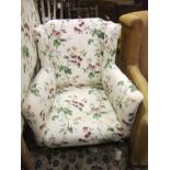 A floral upholstered armchair  CONDITION REPORTS Please note there are no head boards in this lot