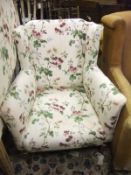 A floral upholstered armchair  CONDITION REPORTS Please note there are no head boards in this lot