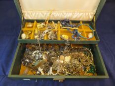 A jewellery box containing various costu