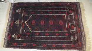 A Caucasian prayer rug, the central aube