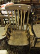 An elm seated slat back carver chair on
