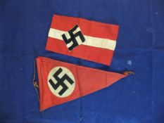 A mid 20th Century Swastika pennant, together with a Third Reich Hitler Youth armband CONDITION