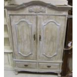 An oak white washed highlighted in duck egg blue two door armoire with two short drawers under