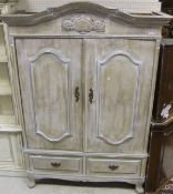 An oak white washed highlighted in duck egg blue two door armoire with two short drawers under