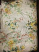 A pair of Warner Fabrics glazed cotton interlined curtains decorated with yellow rose posy sprays