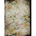 A pair of Warner Fabrics glazed cotton interlined curtains decorated with yellow rose posy sprays