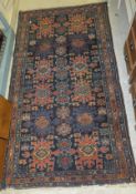 A Caucasian rug, the dark blue centre fi