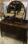 A mahogany dressing table of two short a