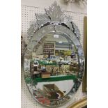 A 20th Century etched glass oval wall mi