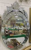 A 20th Century etched glass oval wall mi