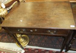 A mahogany single drawer side table with