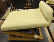 A Victorian walnut framed gout stool with upholstered top, bearing label inscribed "Leveson &