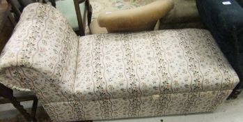 A circa 1900 upholstered ottoman daybed