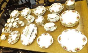 A large collection of Royal Albert "Old Country Roses" pattern dinner and tea wares to include  four