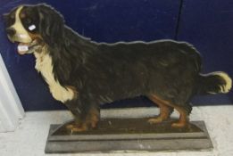 A painted fire screen in the form of a Bernese mountain dog, inscribed verso "Carol Keyes" CONDITION