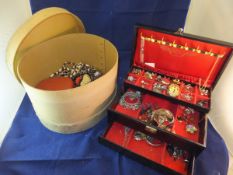 A leather jewellery box containing assor