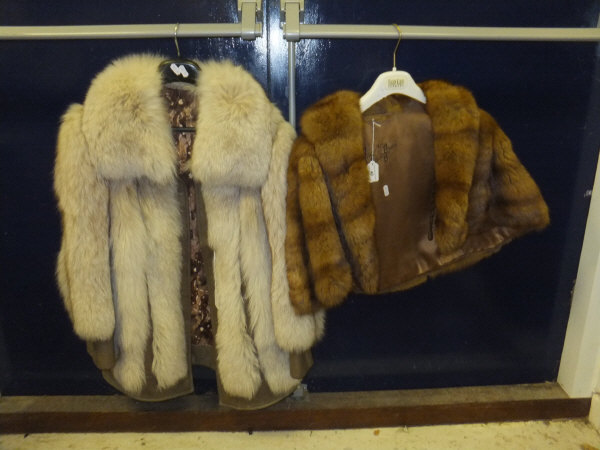 A fur jacket, the satin lining inscribed