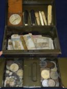 A tin money box containing various Briti