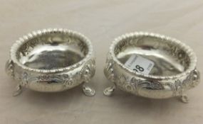 A pair of Victorian silver and embossed