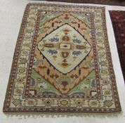 A Turkish carpet, the central diamond sh