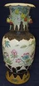 An early 20th Century Chinese porcelain baluster shaped vase, polychrome decorated with water