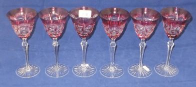 A set of six cut glass wines with ruby /