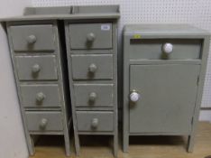 A pair of painted bedside tables and ano