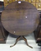 A 19th Century oak tea table, the circul