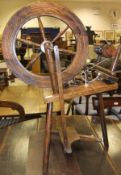 An oak and beech framed spinning wheel