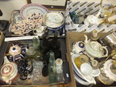 Four boxes of assorted china and glassware to include various vintage bottles, teapots, etc,