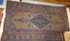 A Caucasian rug, the central diamond sha