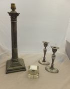 A silver plated Corinthian column table