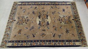 A Chinese Dragon carpet, the central bir