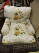 A salon chair in foliate upholstery on t