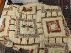 A modern Indian quilt with square panels