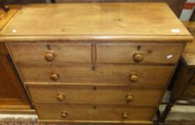 A Victorian pine chest of two short and three long graduated drawers CONDITION REPORTS Some splits