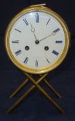 A brass bodied mantel clock with eight d