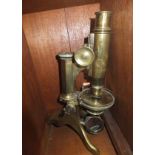 A 19th Century brass monocular microscop